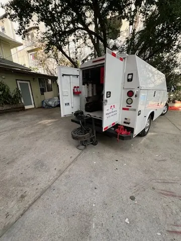 Magnet Plumbing service vehicle on-site for Water Heater Repair in Brickell Key